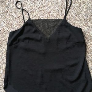 Silky black camisole. Mesh v-neck.